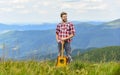 Inspired musician. Summer music festival outdoors. Playing music. Silence of mountains and sound of guitar strings