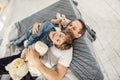 Inspired son and daddy relaxing on bed Royalty Free Stock Photo