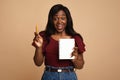 Inspired young black woman student holding notepad and pencil Royalty Free Stock Photo