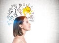 Inspired young woman and her bright idea Royalty Free Stock Photo