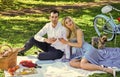 Inspiring feelings. Cheers. Celebrate anniversary. Attractive Couple Enjoying Romantic Sunset Picnic in Countryside Royalty Free Stock Photo