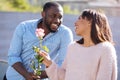 Inspiring handsome man making his lady happy Royalty Free Stock Photo