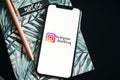 Instagram ads logo on the smartphone screen Royalty Free Stock Photo