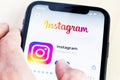 Instagram app on Iphone screen. Royalty Free Stock Photo