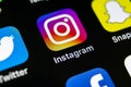 Instagram application icon on Apple iPhone X smartphone screen close-up. Instagram app icon. Social media icon. Social network Royalty Free Stock Photo