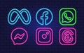Instagram Facebook Meta Whatsupp Threads logos. Neon style. Vector illustration Vinnytsia, Ukraine - December 20, 2023
