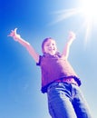 Instagram of Young Girl with Arms Raised Towards Sunshine