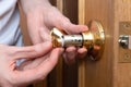 Install The Door Handle With A Lock, Man Hands Repair Door Knob, Repair Locking Mechanism