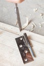 Install door hinges on a wooden door