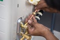 Installation of air conditioner, worker connects copper pipe Royalty Free Stock Photo