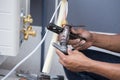 Installation of air conditioner, worker connects copper pipe Royalty Free Stock Photo