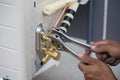 Installation of air conditioner, worker connects copper pipe Royalty Free Stock Photo