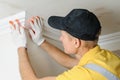 Installation of ceiling moldings. Royalty Free Stock Photo