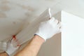 Installation of ceiling moldings. Royalty Free Stock Photo