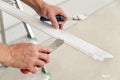 Installation of ceiling moldings. Royalty Free Stock Photo