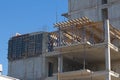 Installation of the Ceiling in A Multi-Storey Building Under Construction. Supporting Beams and Joists Are Supported by