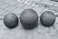 Installation of concrete spheres on the sidewalk Royalty Free Stock Photo