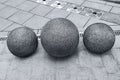 Installation of concrete spheres on the sidewalk Royalty Free Stock Photo