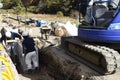 Installation construction of street gutter on the road Royalty Free Stock Photo