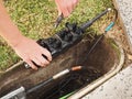 Installation of a customer connection drop cable into a Multiport Royalty Free Stock Photo