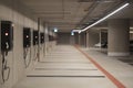 Installation of electric car charging stations in an underground parking facility underway Royalty Free Stock Photo