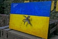 Installation in the form of a Ukrainian flag and a Russian exploded shell, called a Ukrainian flower. Kiev, Ukraine - September 24