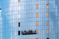 Installation of glass on the facade of an office multistory building