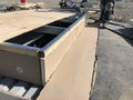 Installation of ISO on AC base; roofing repairs on ballasted EPDM commercial roof with