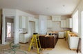 Custom kitchen cabinets in various stages of installation base for island in center Royalty Free Stock Photo