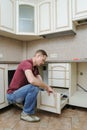 Installation of kitchen furniture.