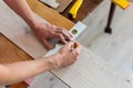 Worker marks the length of the laminate Royalty Free Stock Photo