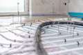 installation of liquid concrete on the floor for underfloor heating