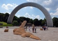 Sculpture Installation `Merman` - a floating man on the European Square in Kiev near the People