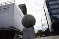 Installation of a metal ball on the Puerto Madero district of Buenos Aires Royalty Free Stock Photo