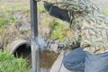 Installation of a metal column using a welding machine