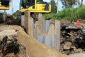 Installation of metal structures - immediate support for draining the soil at the construction site of the road in