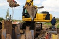 Installation of metal structures - immediate support for draining the soil at the construction site of the road in