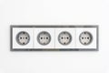 Installation modern sockets on a painted wall close-up. Grey and white electrical outlet. Royalty Free Stock Photo