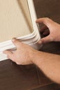 Installation of New Baseboard Bull Nose Cornerns Royalty Free Stock Photo