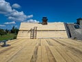 Installation of new roof boards at construction the assembled roof on house Royalty Free Stock Photo