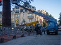 Installation of an outdoor Christmas tree. Workers on a crane install the main city Christmas tree. The holiday is approaching.