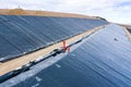 Installation process of geosynthetics in industry and mining Royalty Free Stock Photo