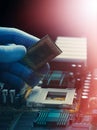 The installation of the processor into the socket of the motherboard. Royalty Free Stock Photo