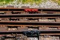 Installation of rail fastening. Railway turnout mechanism. Filming of the Soviet-era children`s railway in the Royalty Free Stock Photo