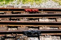 Installation of rail fastening. Railway turnout mechanism. Filming of the Soviet-era children`s railway in the Royalty Free Stock Photo