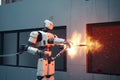 Installation of the robot at the exhibition, An AI robot fireman equipped with a fire fighting water pipe, AI Generated