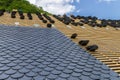 Installation of slate roofing Tiles on a roof Royalty Free Stock Photo