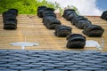 Installation of slate roofing Tiles on a roof