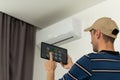 Installation service repair maintenance of an air conditioner, by cryogenist technican worker evacuate the system with