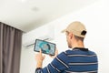 Installation service repair maintenance of an air conditioner, by cryogenist technican worker evacuate the system with